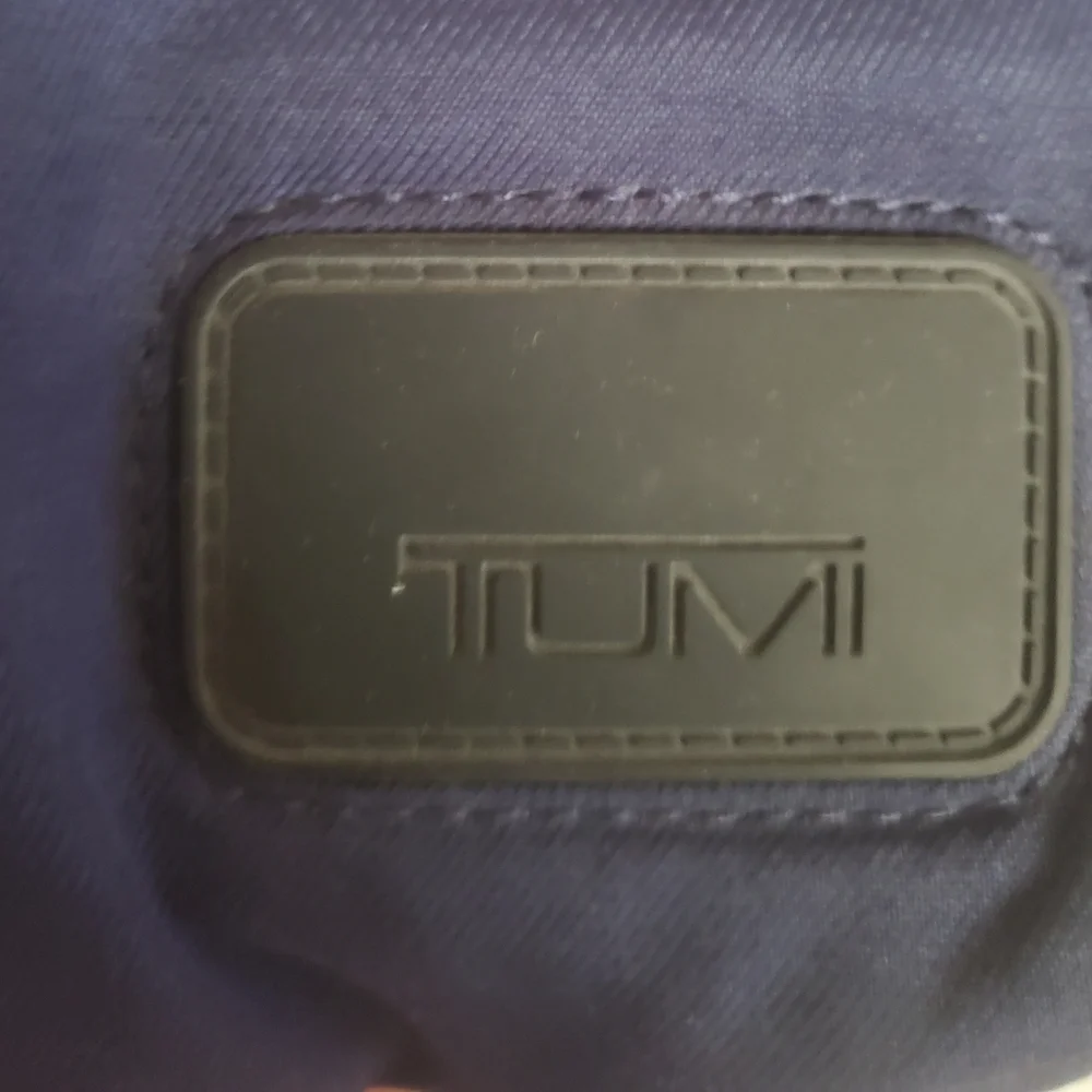 TUMI Navy Blue Organizer Travel Crossbody Bag.